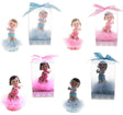 Baby on Bib Holding on Pacifier Poly Resin